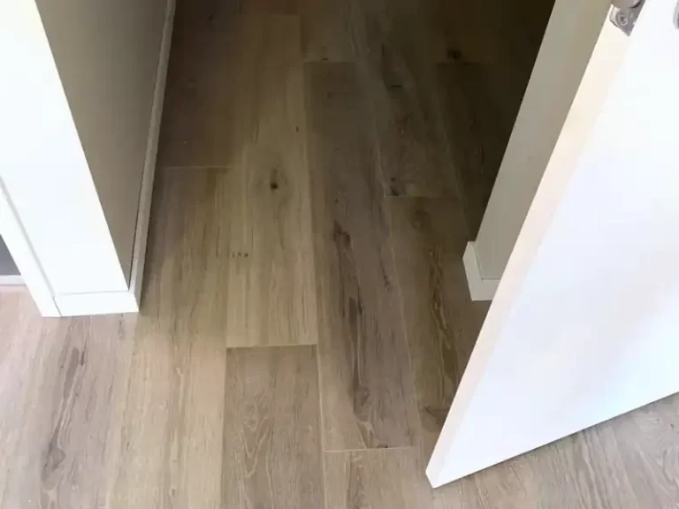 Timber-look plank flooring at a bedroom doorway in a Sydney home