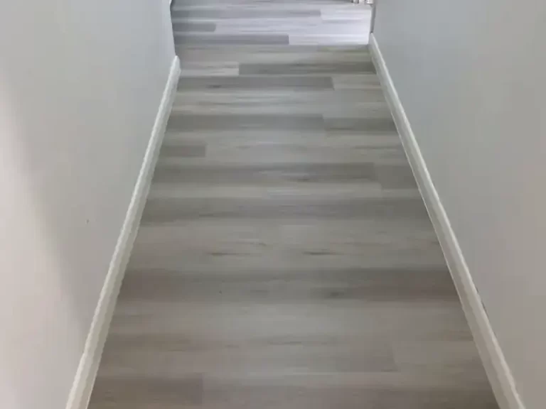 Timber-look plank flooring running down a hallway in a Sydney home