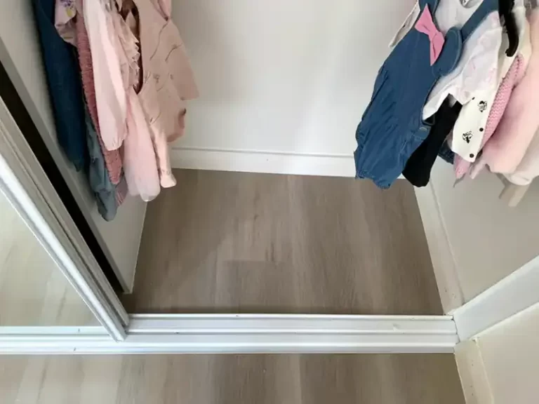 Timber-look flooring in a walk-in robe of a Sydney home